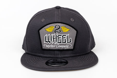 Solid charcoal grey, New Era 9Fifty, Snapback with yellow wings/grey logo